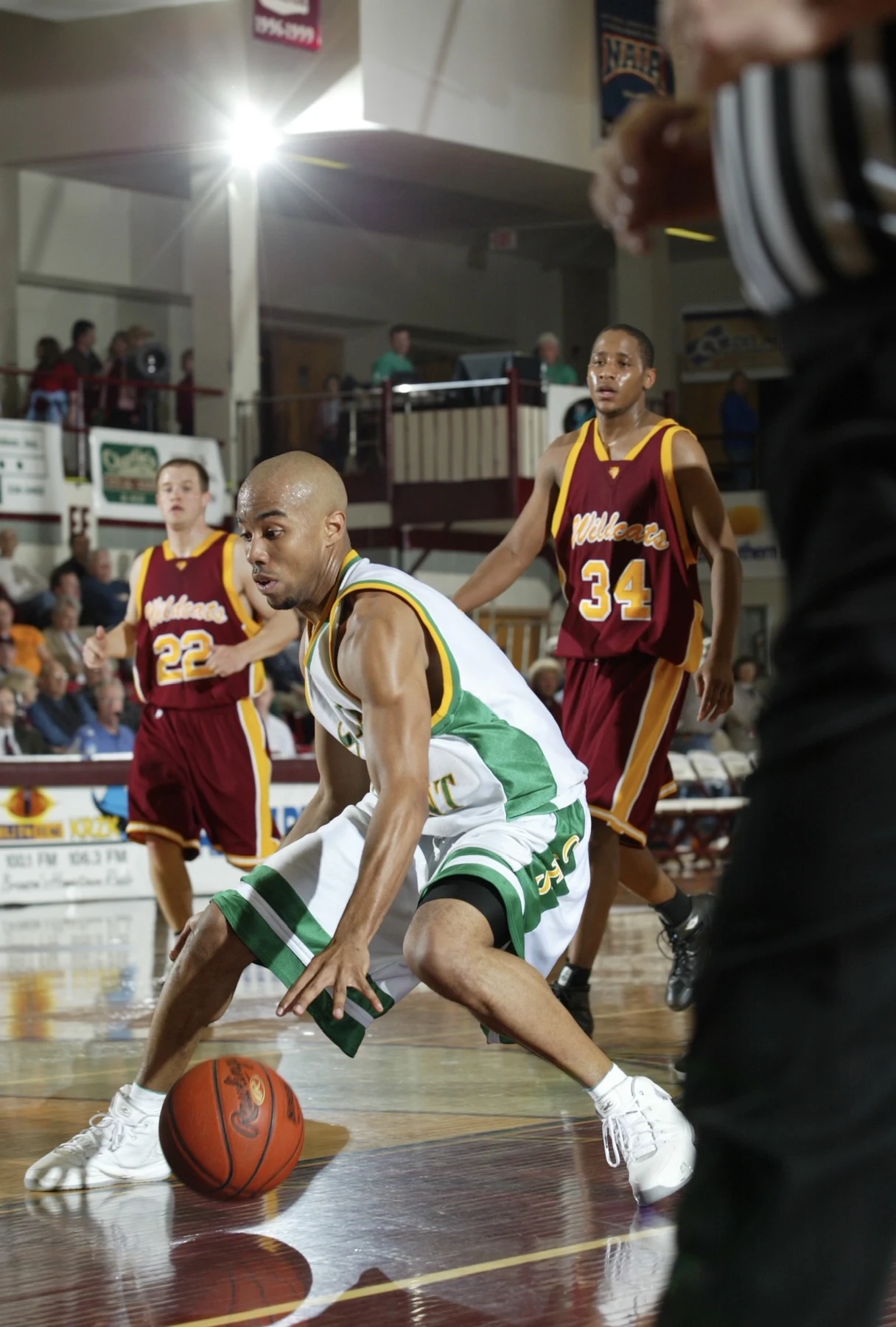 Kenny Roberts playing college basketball